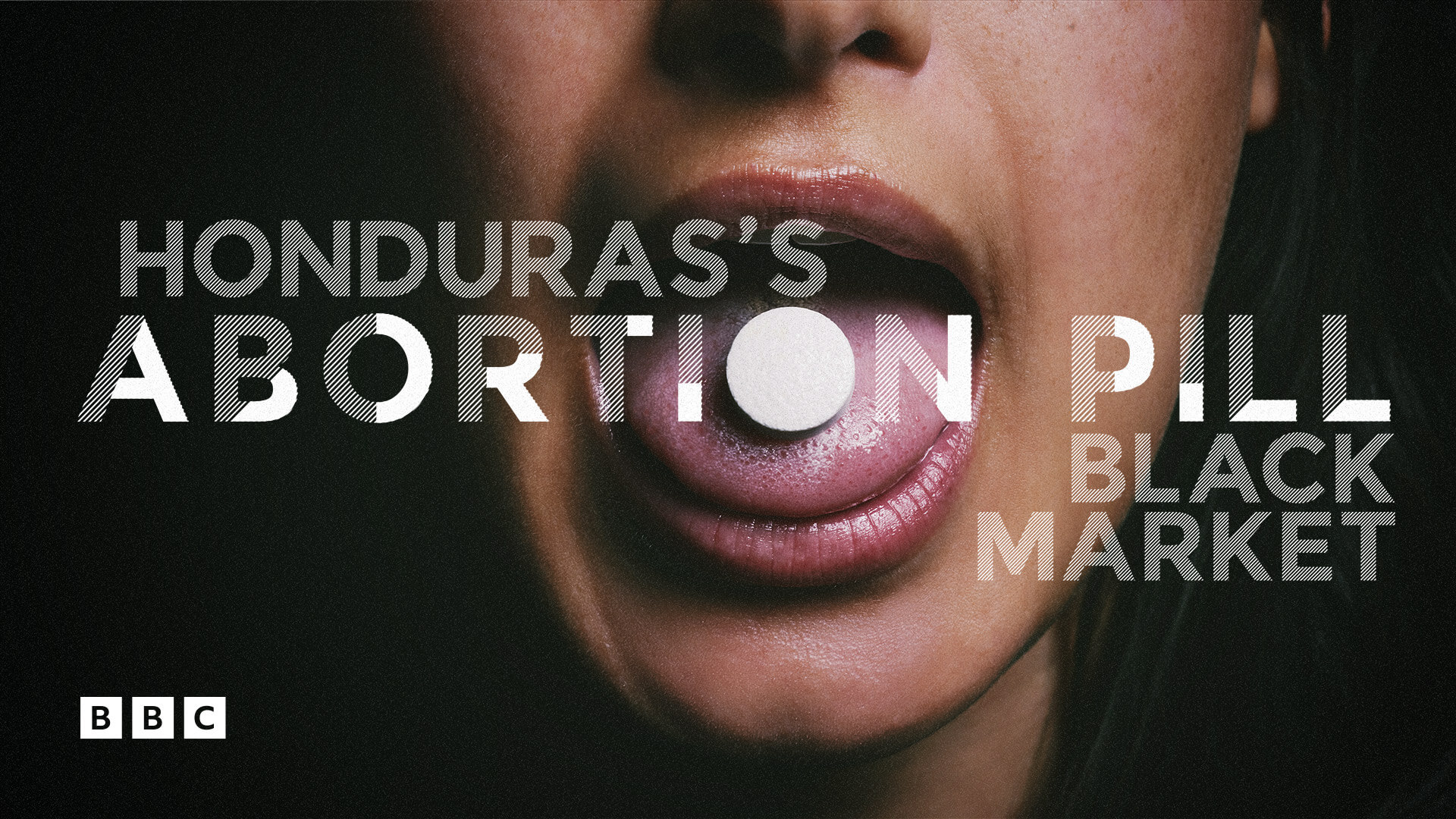 Image of woman with a pill on her tongue