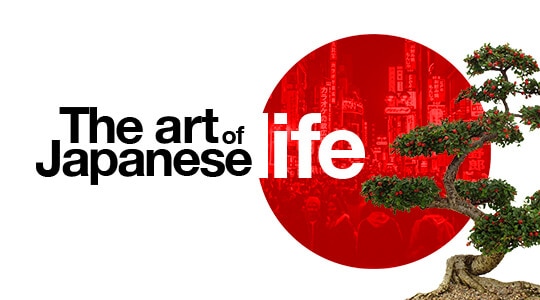 Image of the red circle of Japan with the cityscape within, as well as a bonzai tree